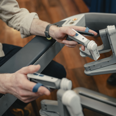 Someone practising with a surgical robot